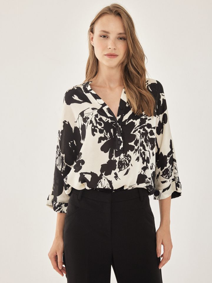 חולצה שינה עטלף בצבע שחור