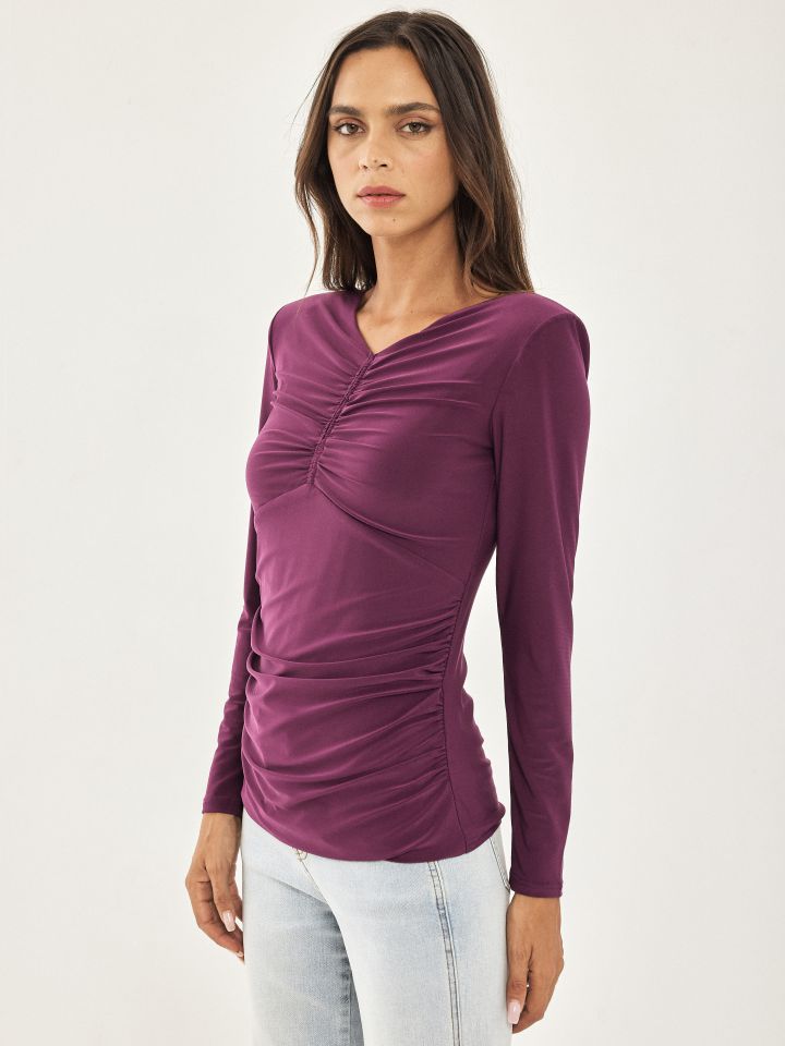 חולצה פתחים וכיווצים בצבע חציל