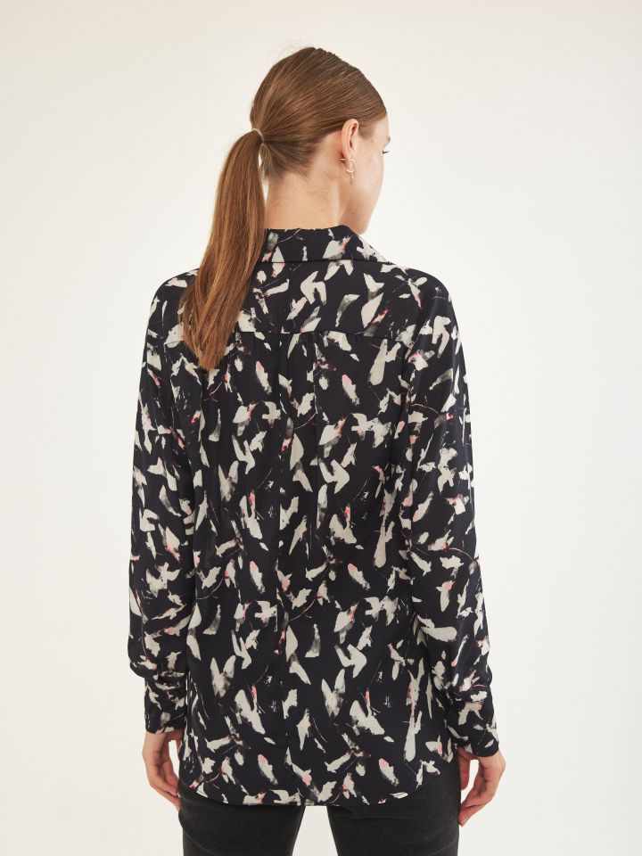 חולצה צוארון MIAMI בצבע שחור/לבן