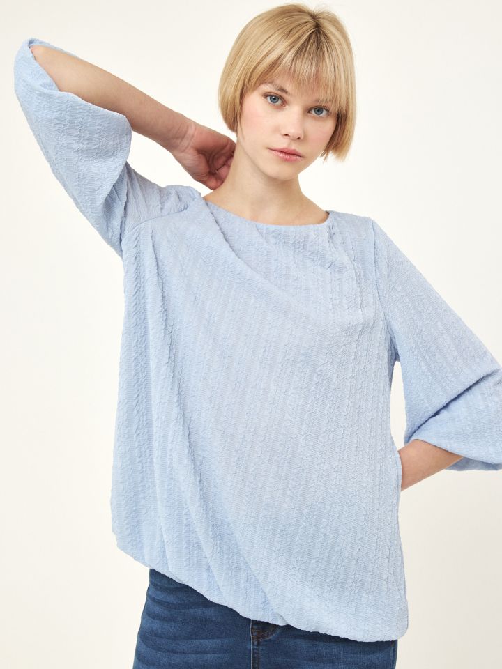 חולצה בלון בצבע תכלת