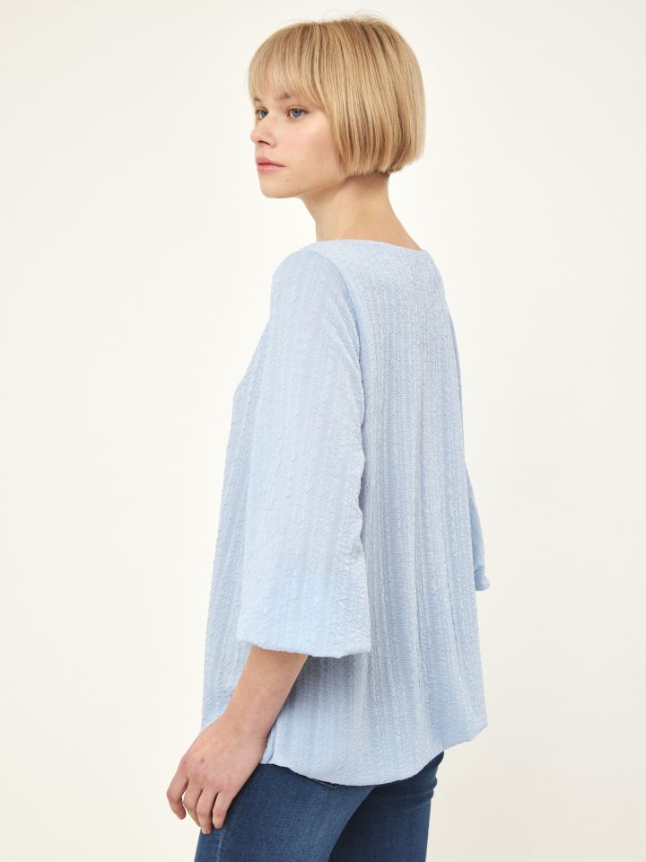 חולצה בלון בצבע תכלת