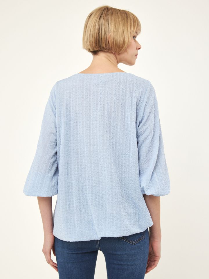 חולצה בלון בצבע תכלת