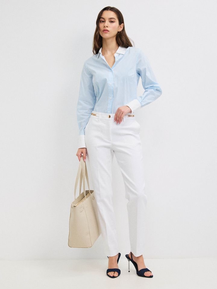 חולצה פסים שילוב מנגטים בצבע תכלת