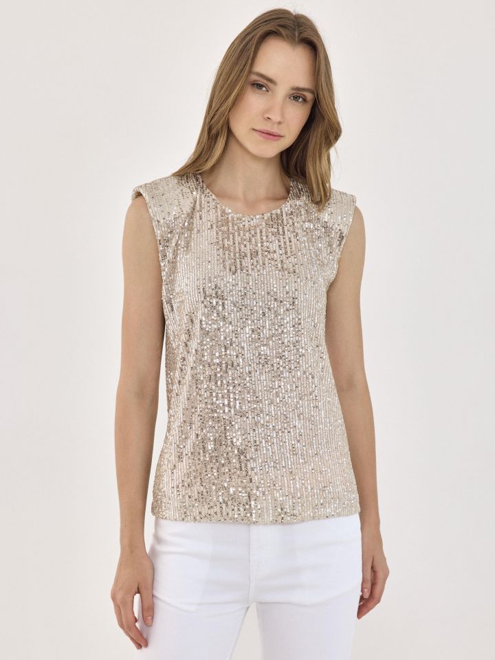 חולצה פייטים בצבע בייז’