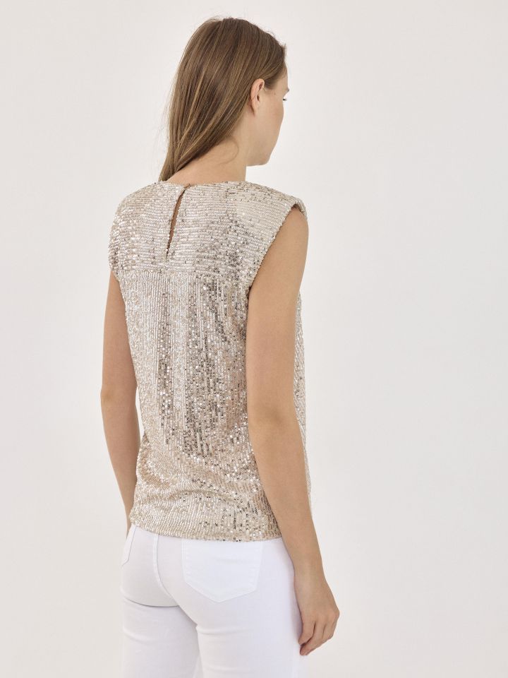 חולצה פייטים בצבע בייז’