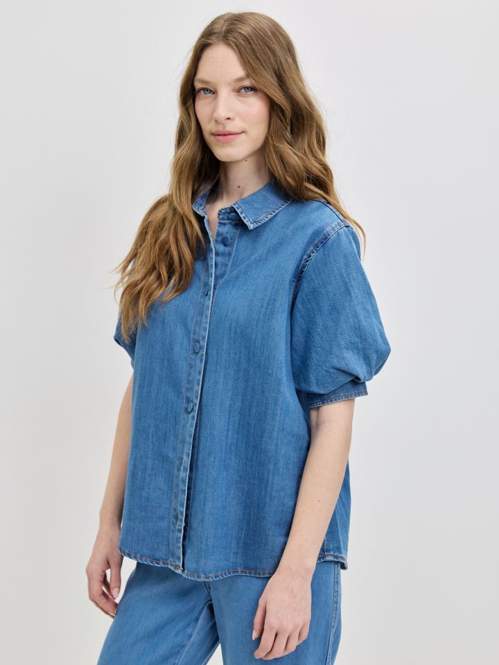 חולצה ג’ינס שרוולי בלון בצבע ג’ינס בהיר