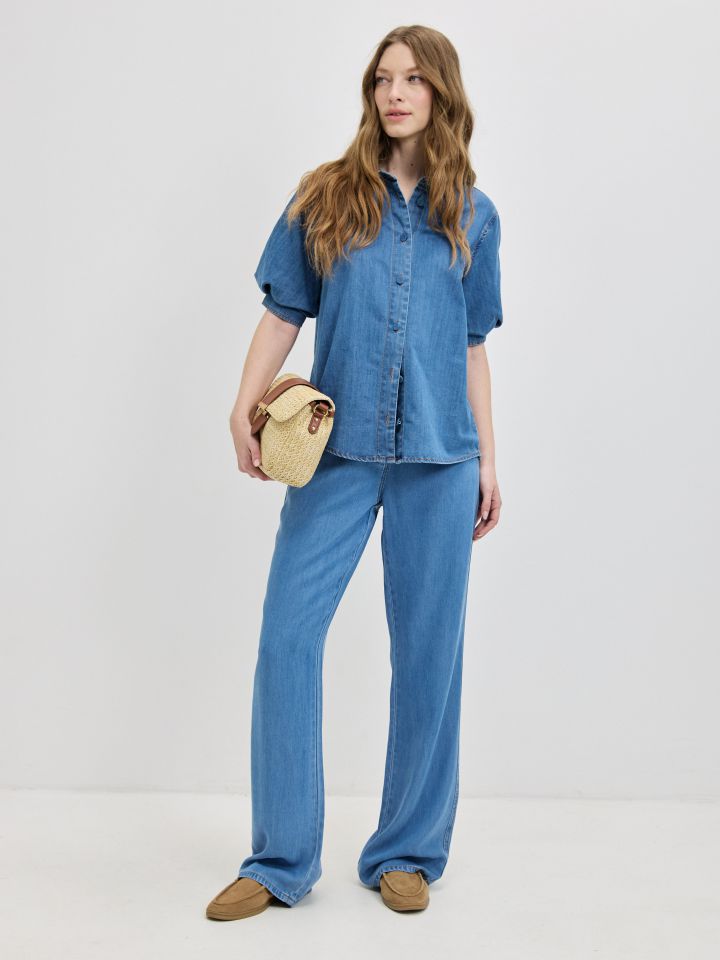 חולצה ג’ינס שרוולי בלון בצבע ג’ינס בהיר