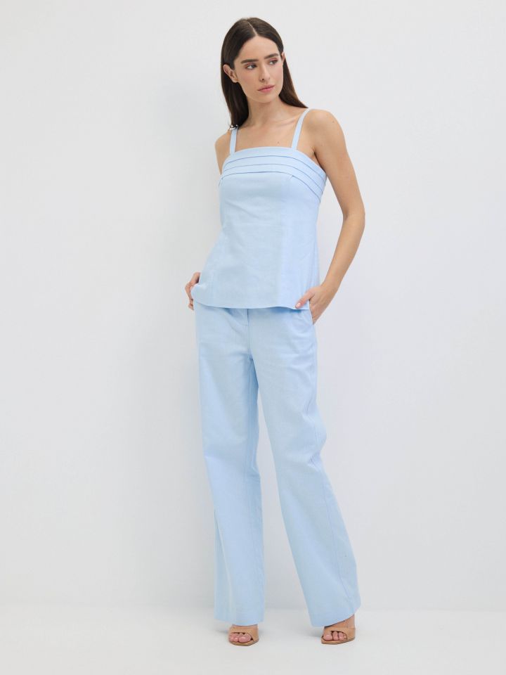 חולצה כפלים בפרונט בצבע תכלת