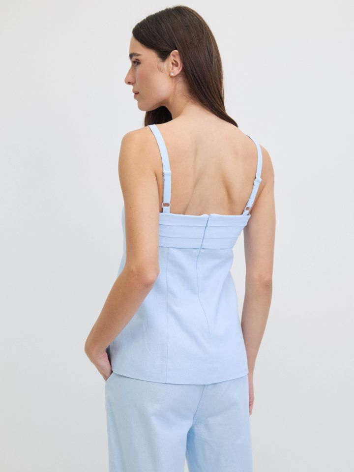 חולצה כפלים בפרונט בצבע תכלת