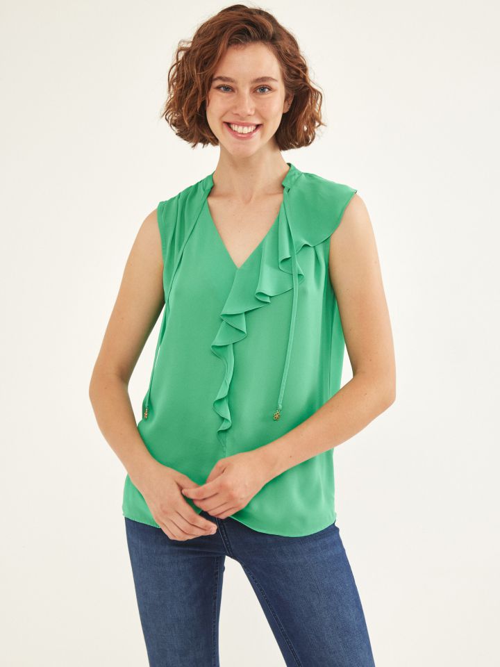 חולצה מלמלה בצבע ירוק בהיר