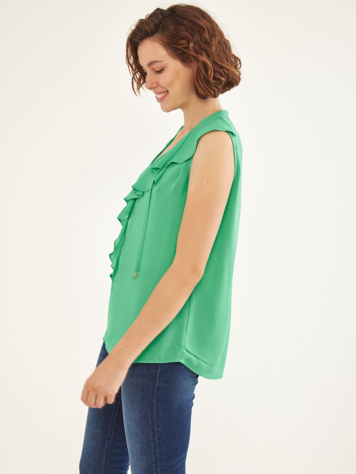 חולצה מלמלה בצבע ירוק בהיר
