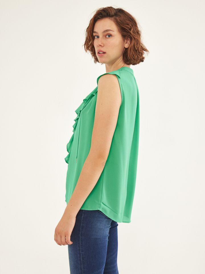 חולצה מלמלה בצבע ירוק בהיר