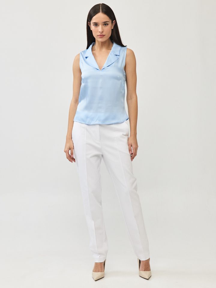 חולצה סטן קשירה בגב בצבע תכלת אורלי