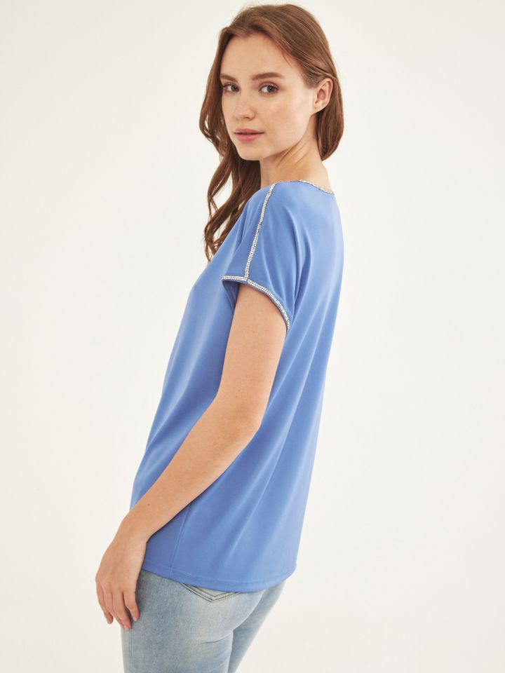 חולצה אמזון יהלומים בצבע כחול ונסה