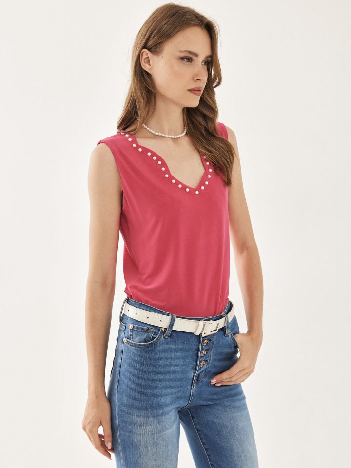 חולצה פתח גלים ופנינים בצבע פוקסיה