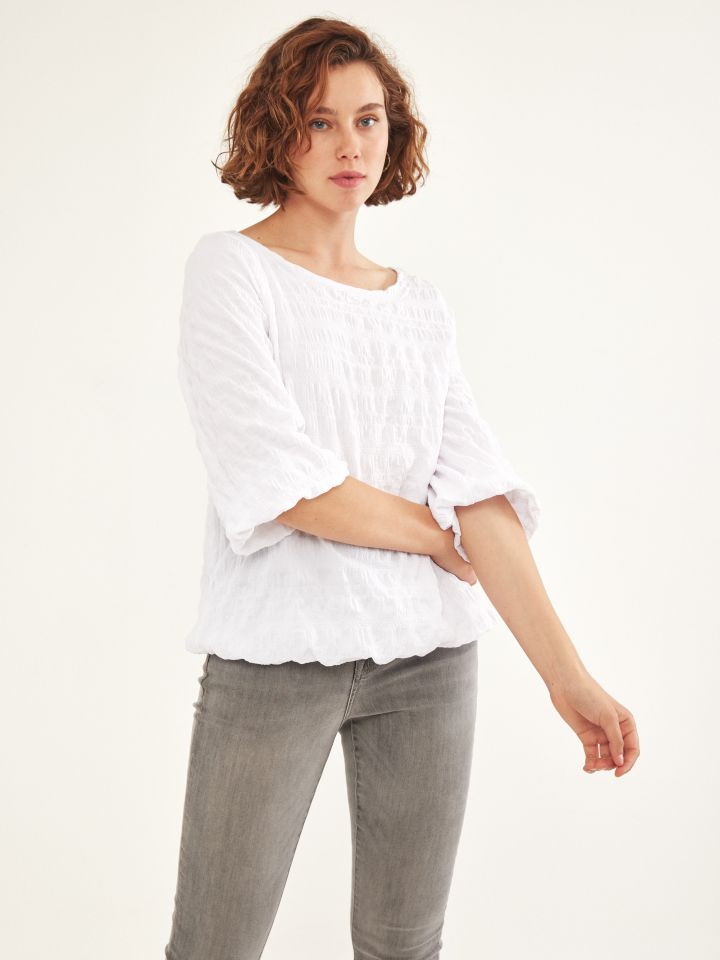 חולצה בלון בצבע לבן