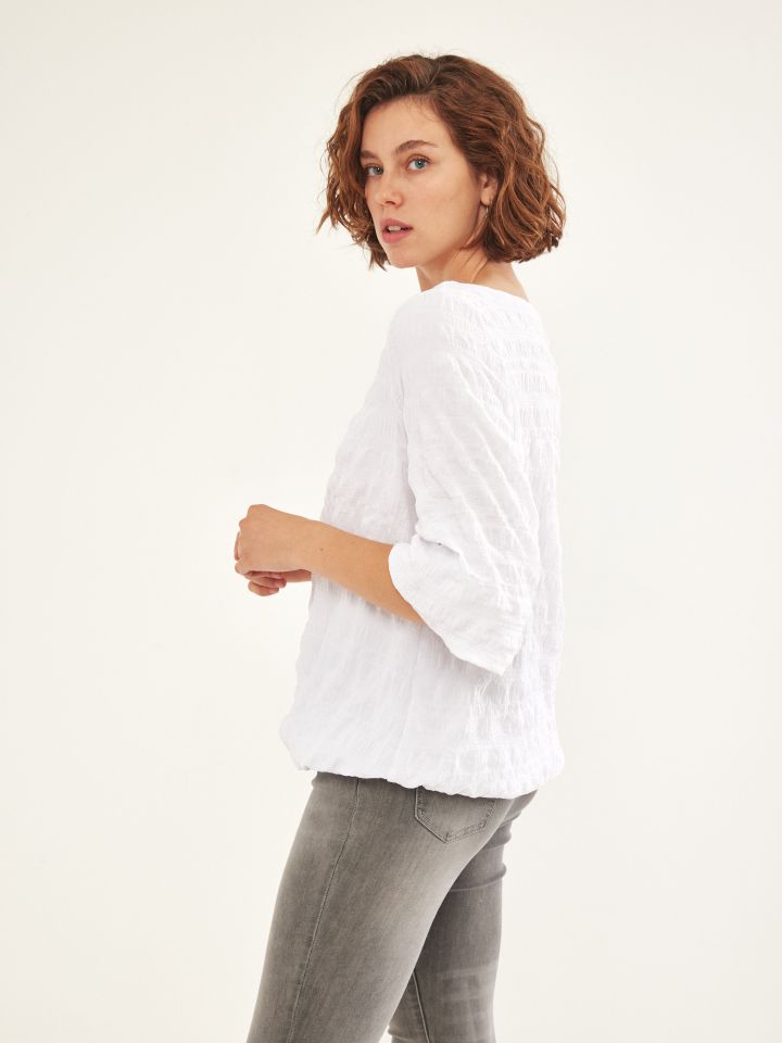 חולצה בלון בצבע לבן