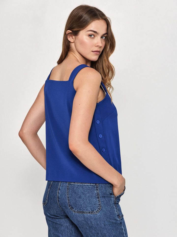 חולצה כפתורי צד בצבע כחול