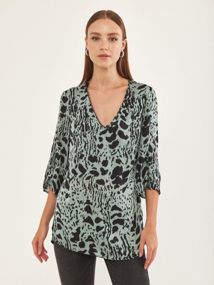 חולצה V דפוס לולאות בצבע ירוק בהיר