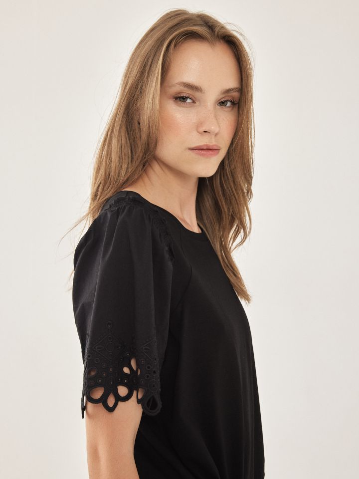 חולצה שרוול קרושה בצבע שחור