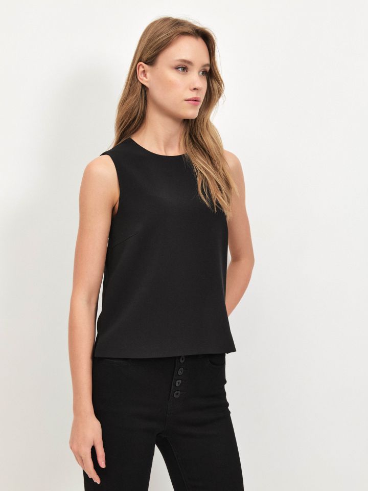 חולצה NATALY רוכסן בגב בצבע שחור