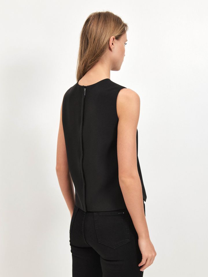 חולצה NATALY רוכסן בגב בצבע שחור