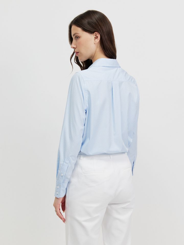 חולצה פסים כפתורי פנינה בצבע תכלת מעושן