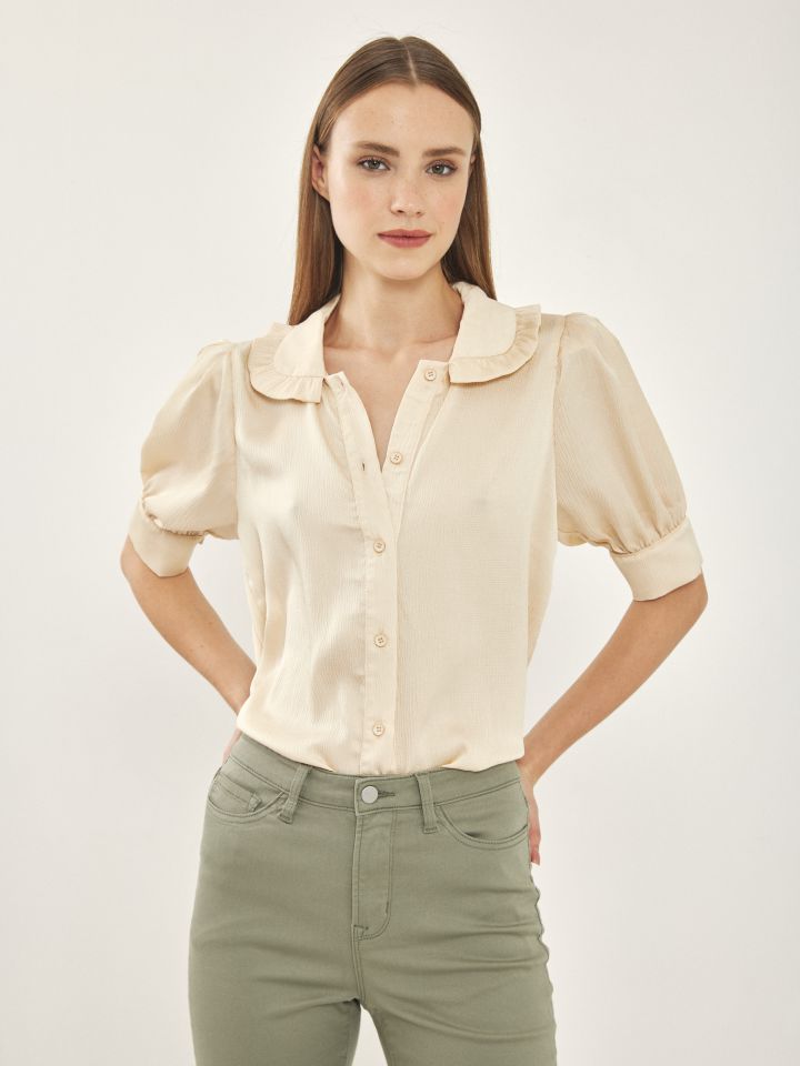 חולצה מכופתרת מלמלה בצבע בייז’