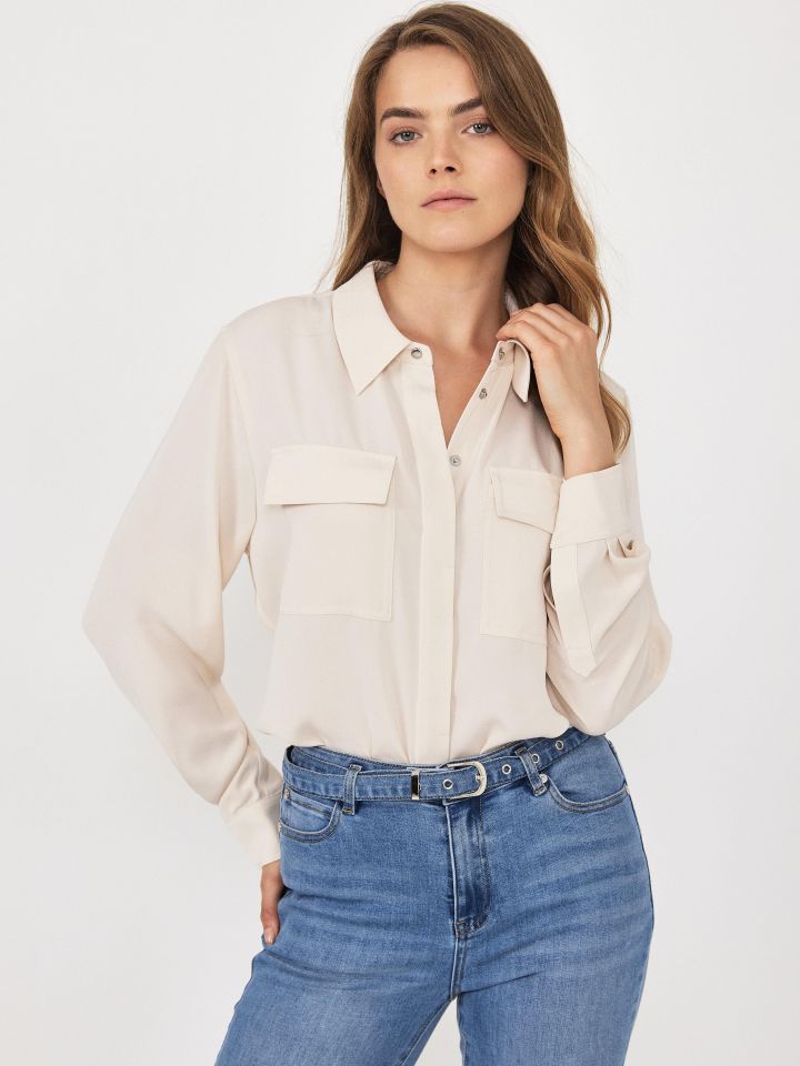 חולצה לחצניות כיסים בצבע בייז’