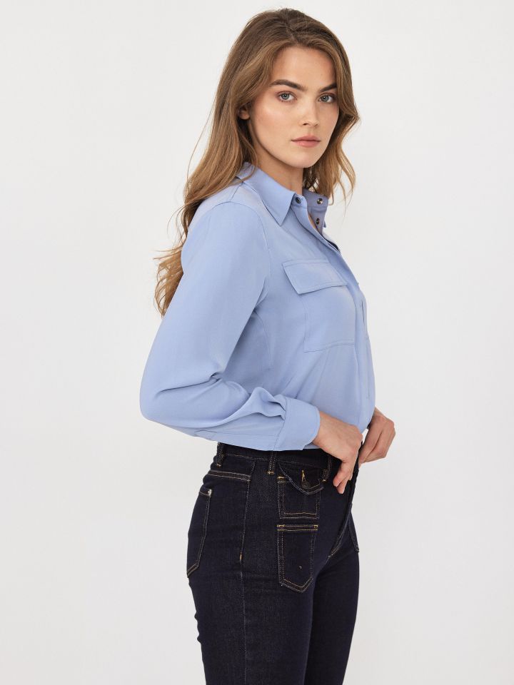 חולצה לחצניות כיסים בצבע תכלת אורלי