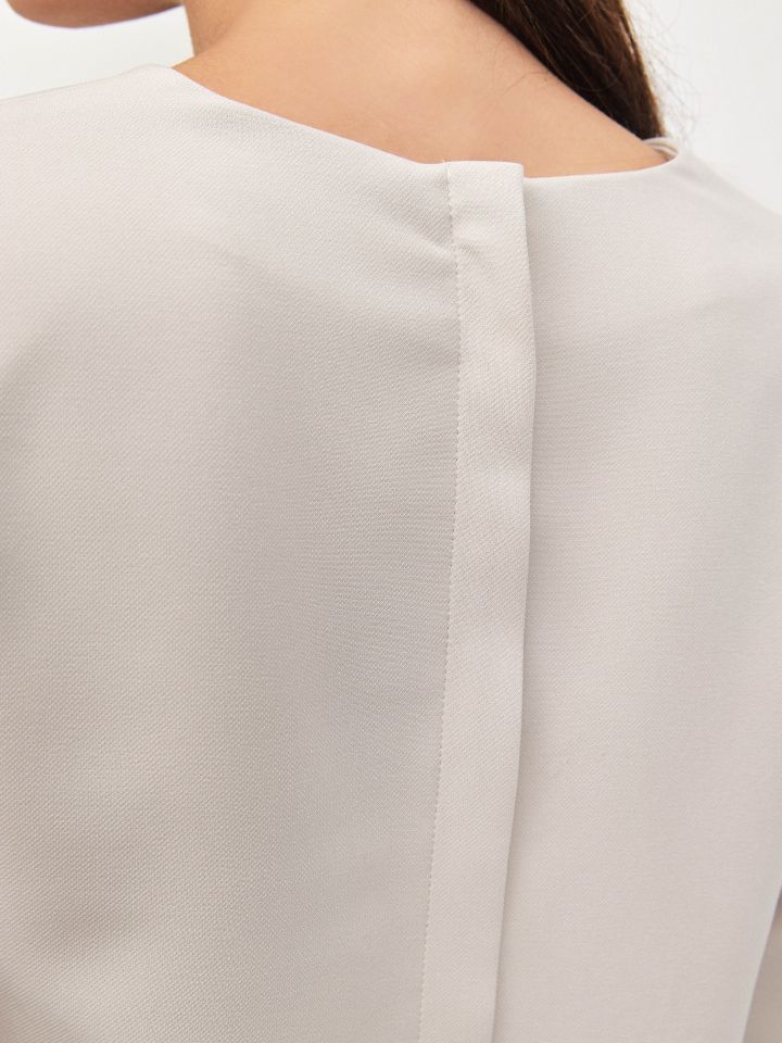 חולצה רוכסן בגב בצבע אבן