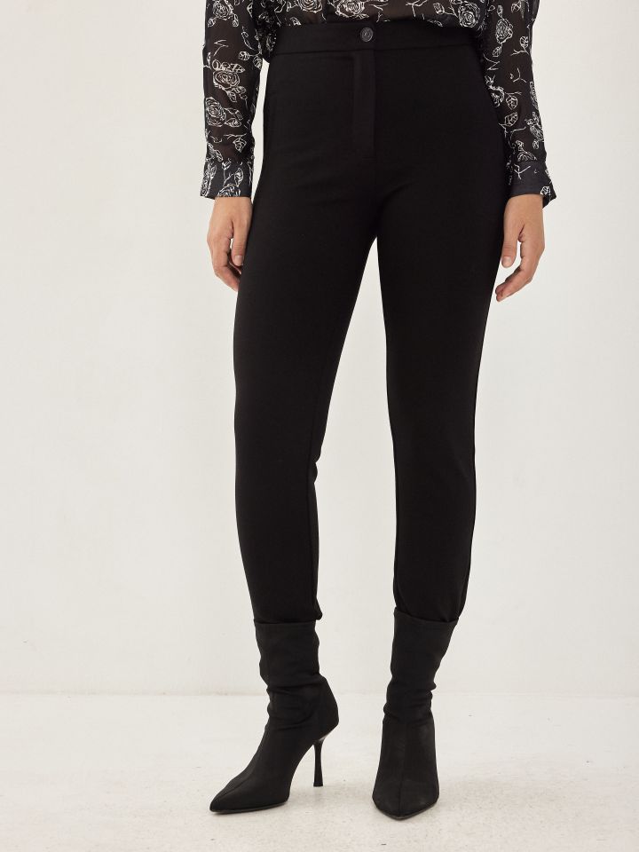 מכנסי כיתוב בלבן PROMO בצבע שחור