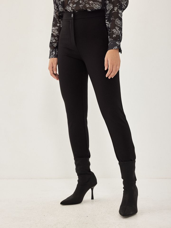 מכנסי כיתוב בלבן PROMO בצבע שחור