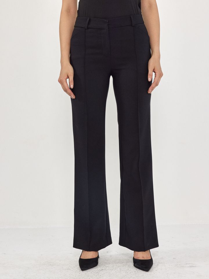 מכנסיים COMO כיסי אלכסון בצבע שחור