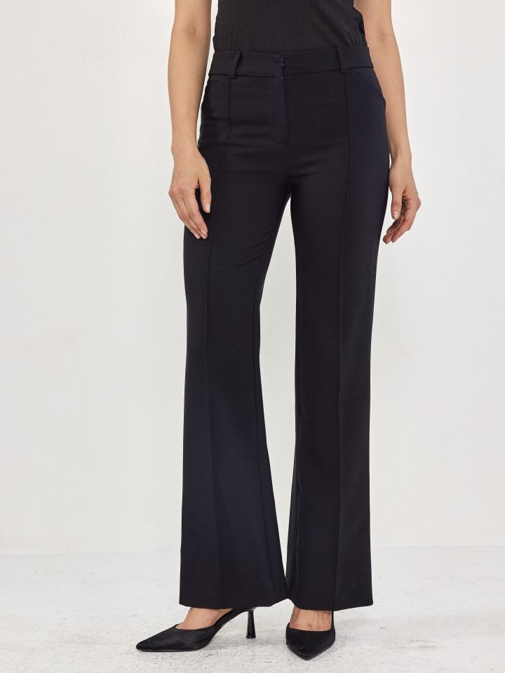 מכנסיים COMO כיסי אלכסון בצבע שחור