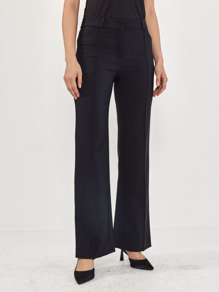 מכנסיים COMO כיסי אלכסון בצבע שחור