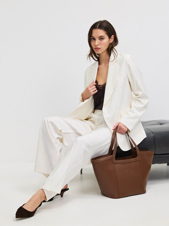 מכנסיים דמוי פישתן בצבע אופוויט