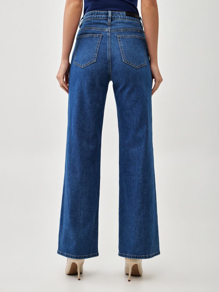 מכנסיים גינס מתרחב בצבע ג’ינס כהה