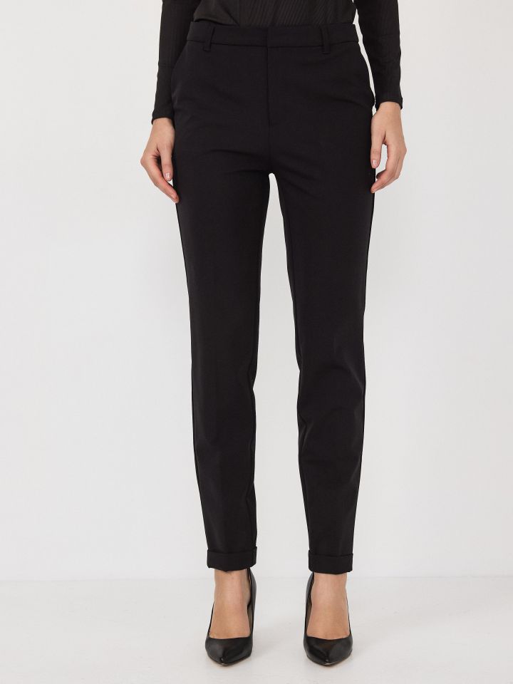 מכנסיים כיסי צד + מנג’ט בצבע שחור