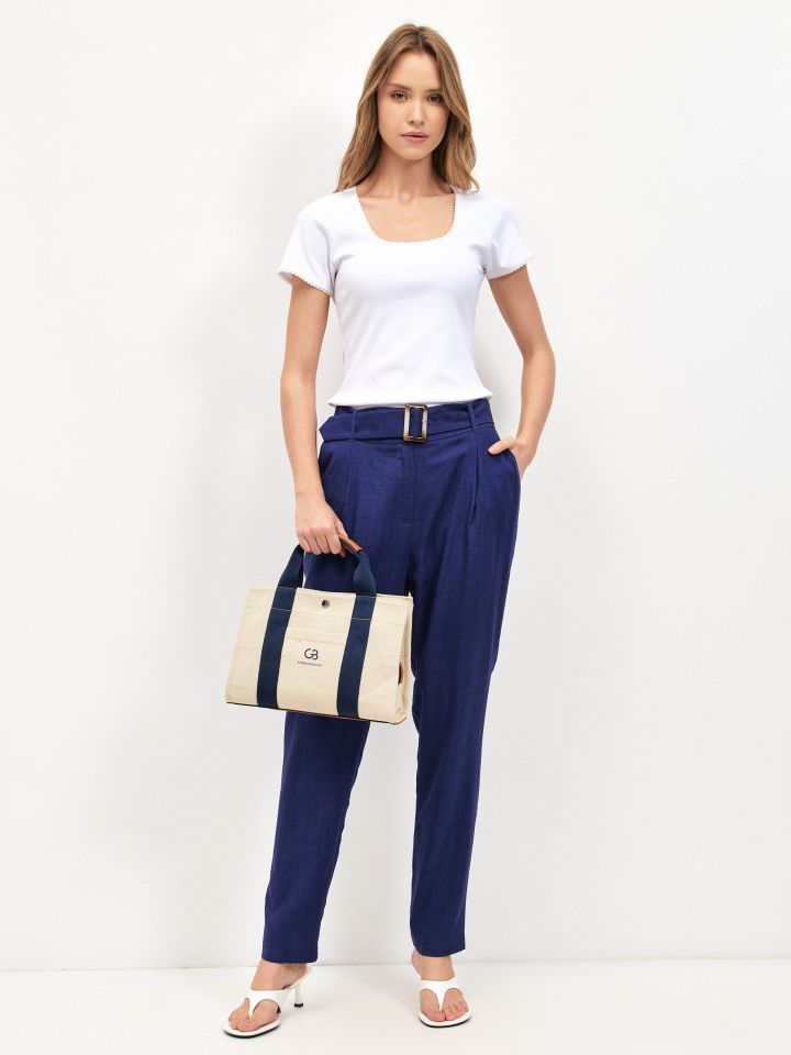 מכנסיים מראה פישתן + חגורה בצבע כחול אינדיגו