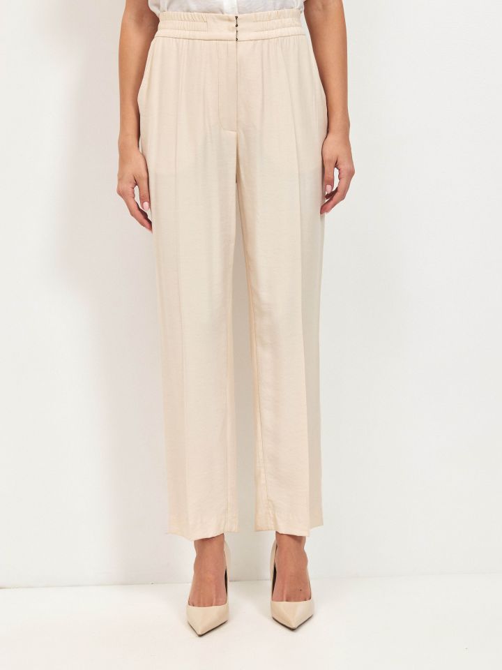 מכנסיים גומי בגב בצבע בייז’