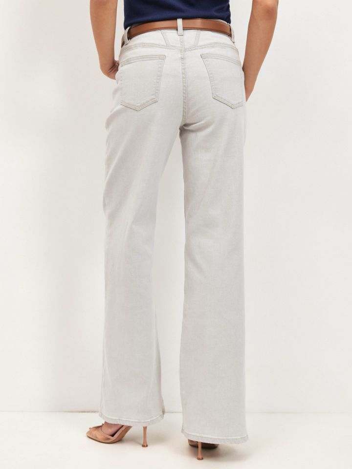 מכנסיים גינס GREY בצבע אפור כסף