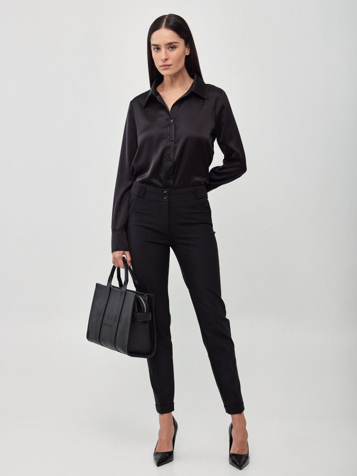 מכנסיים כיסי צד מנג’ט בצבע שחור