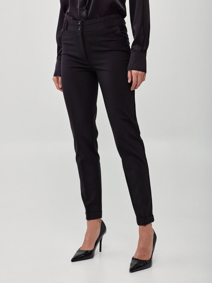 מכנסיים כיסי צד מנג’ט בצבע שחור