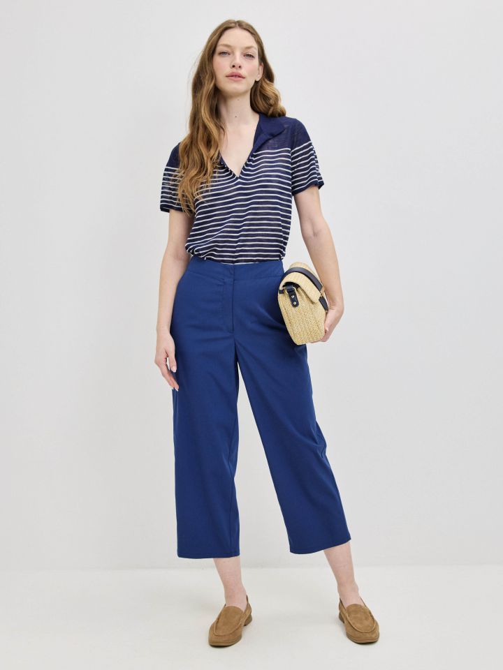 מכנסיים כיסי צד 8/9 בצבע כחול אינדיגו