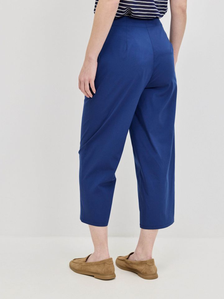 מכנסיים כיסי צד 8/9 בצבע כחול אינדיגו