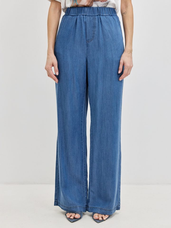 מכנסיים ג’ינס גומי בצבע ג’ינס