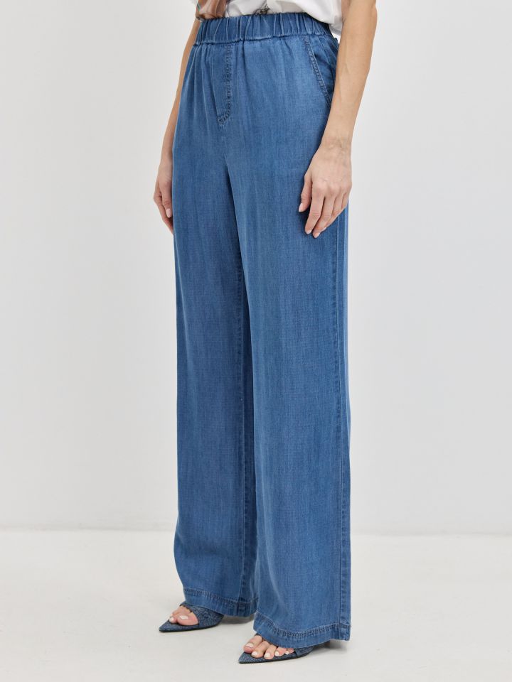 מכנסיים ג’ינס גומי בצבע ג’ינס