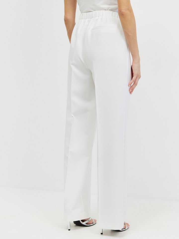 מכנסיים כיסי צד PROMO בצבע אופוויט