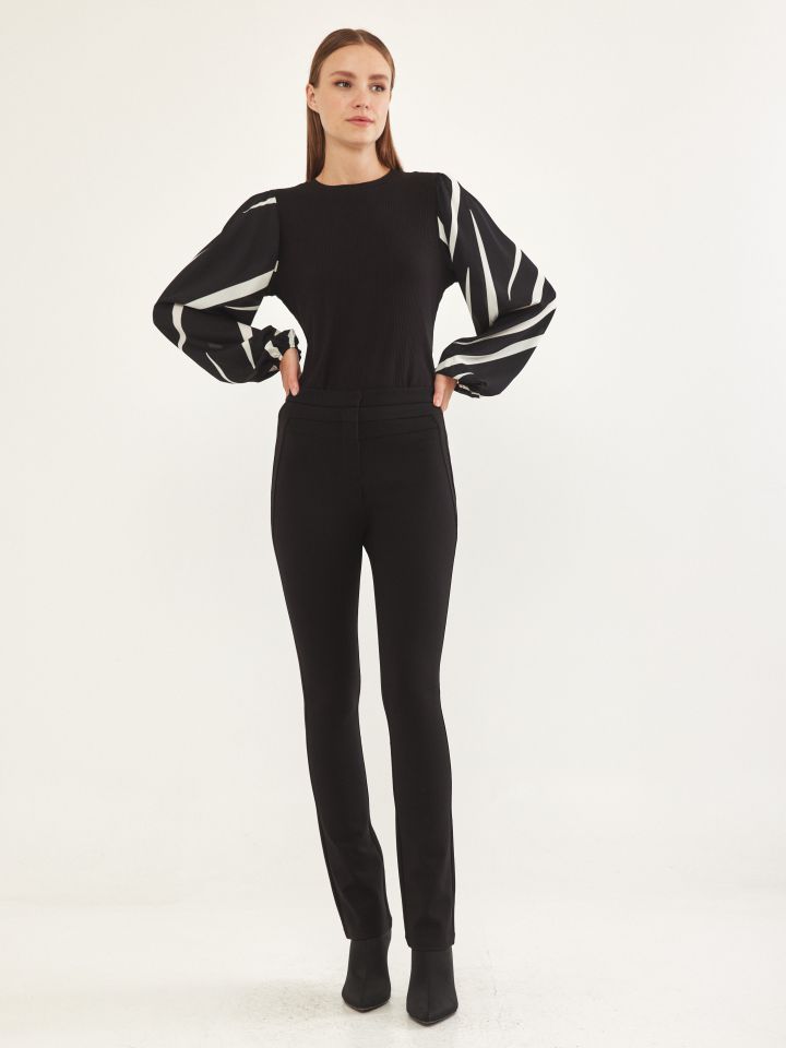 מכנסי מילנו חגורה חתכים בצבע שחור